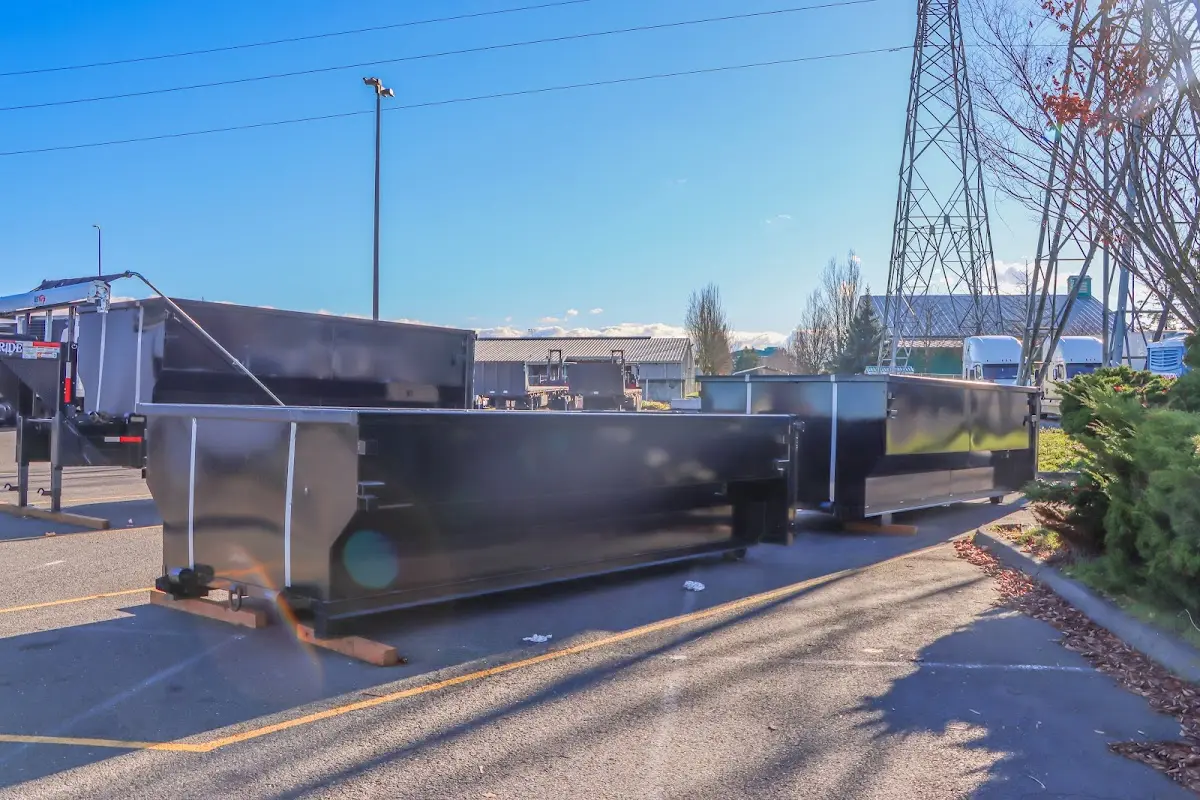 Roll-off dumpster ready for waste disposal at job site for Residential Dumpster Rental in Marshfield